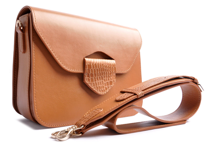 ARROW BOX . SHOULDERBAG with magnetical closure . satin-finished calfskin in cognac brown . OSTWALD Leather Manufactory.