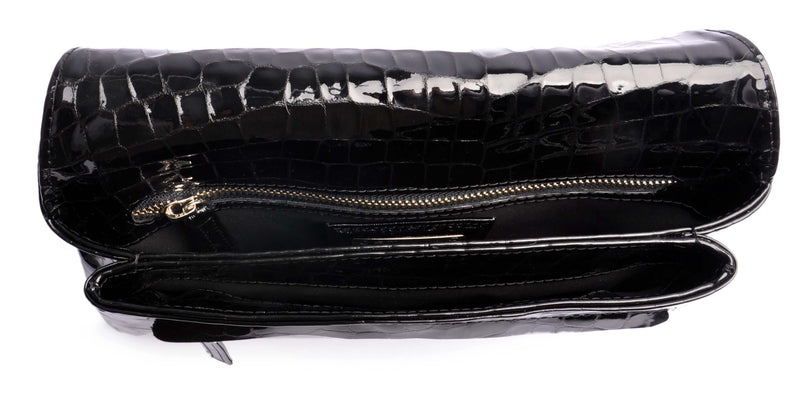 Envelope Clutch . Black CLUTCH . Fine micro-suede lining & Silver -coloured metal elements . Handcrafted by OSTWALD