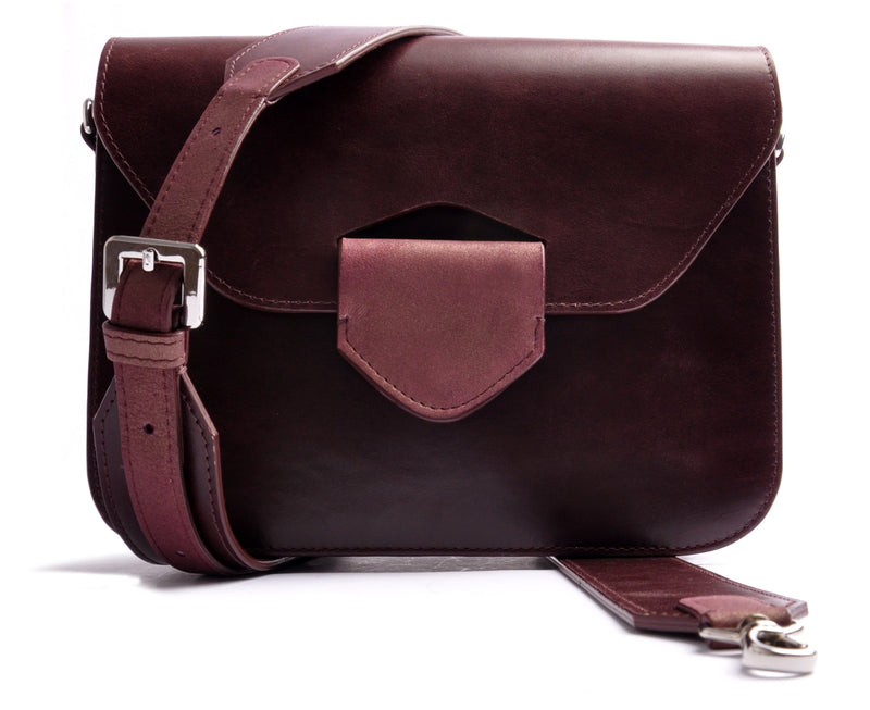 Shop Online . ARROW BOX . SHOULDERBAG . Burgundy Calf leather . Fine micro-suede lining, Silver -coloured metal elements . Magnetic closure . Handcrafted by OSTWALD