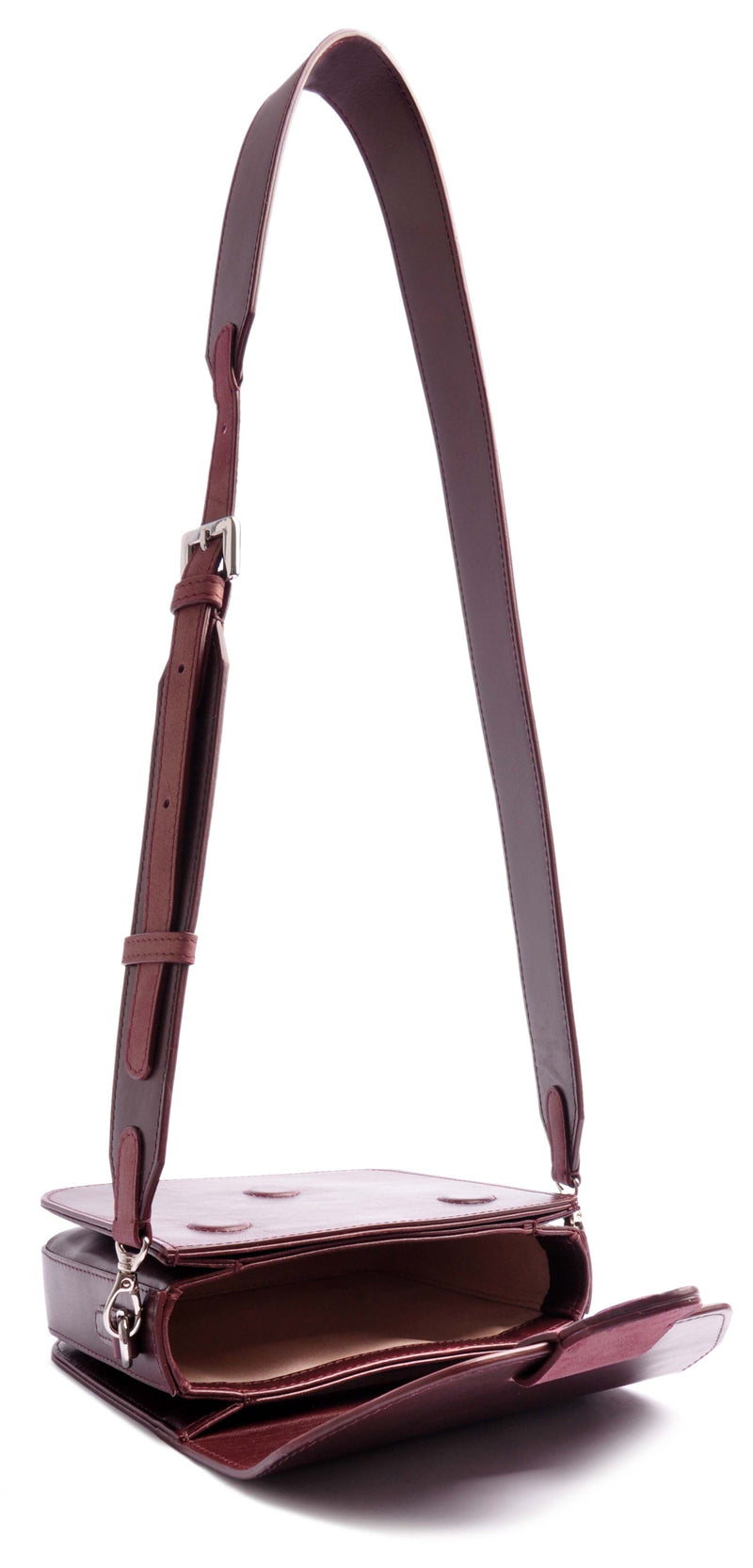 Shop Online . ARROW BOX . SHOULDERBAG . Burgundy Calf leather . Fine micro-suede lining, Silver -coloured metal elements . Magnetic closure . Handcrafted by OSTWALD